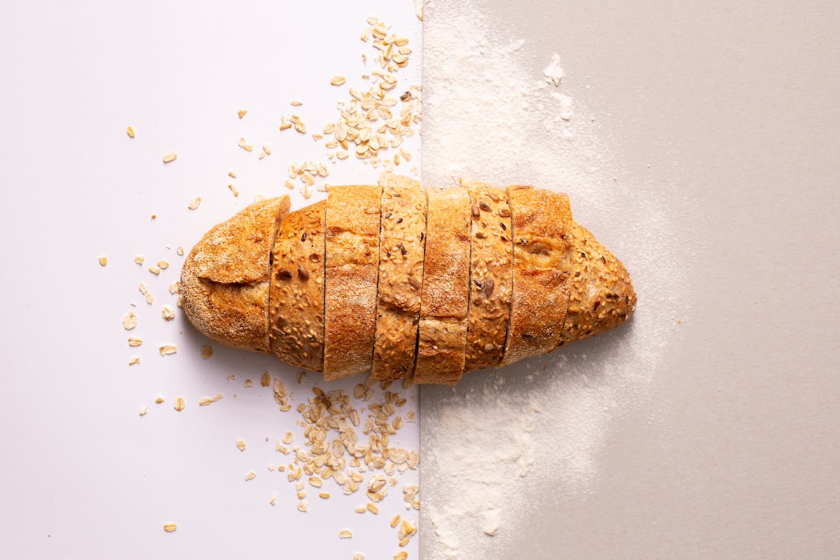 Sliced artisan bread showing crumb and crust texture